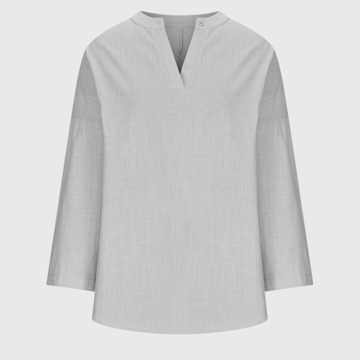 Camicia da donna fluida senza maniche con bottoni – Elegante