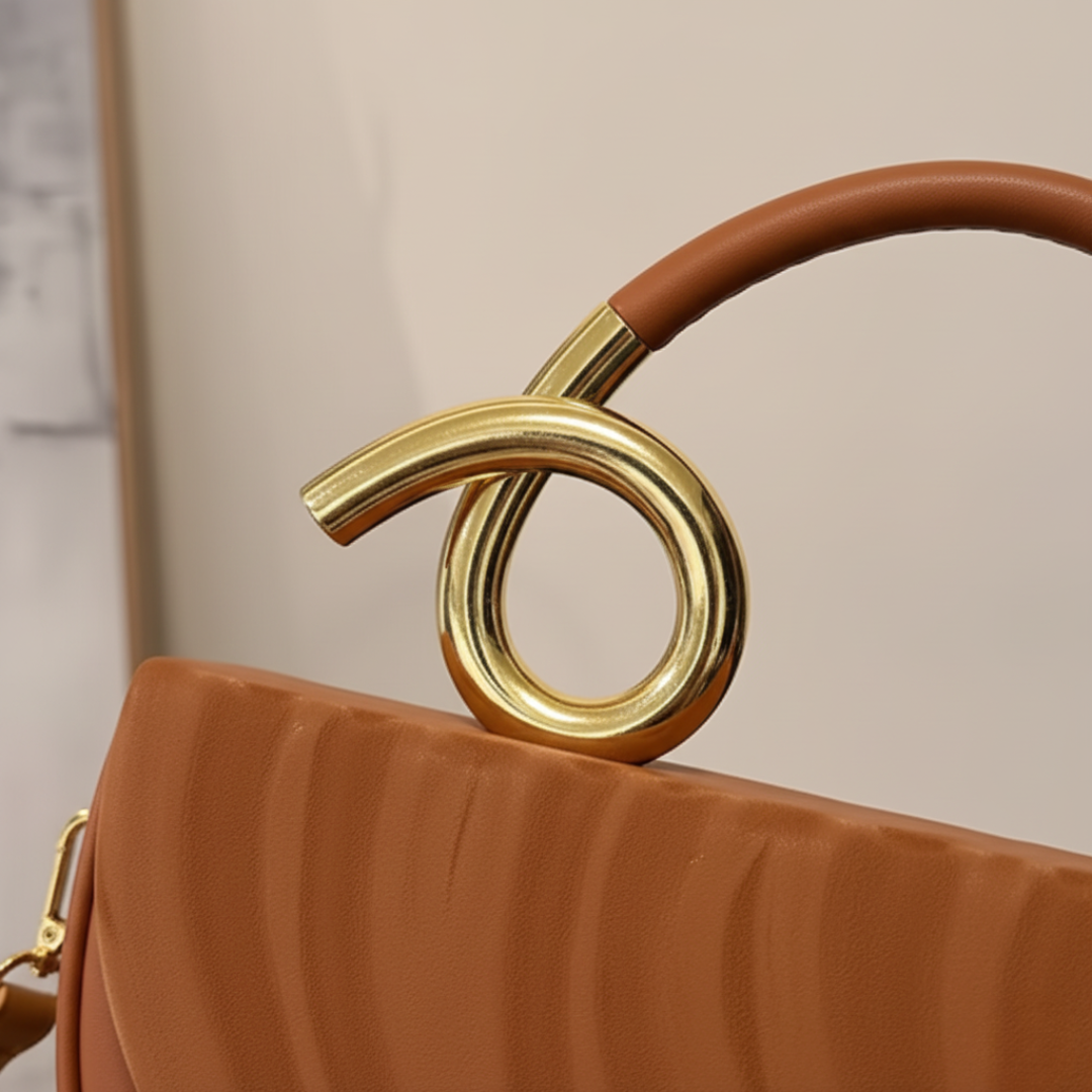 Borsa da donna con manico dorato