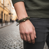 Braccialetto paracord da uomo con teschi in metallo bronzato