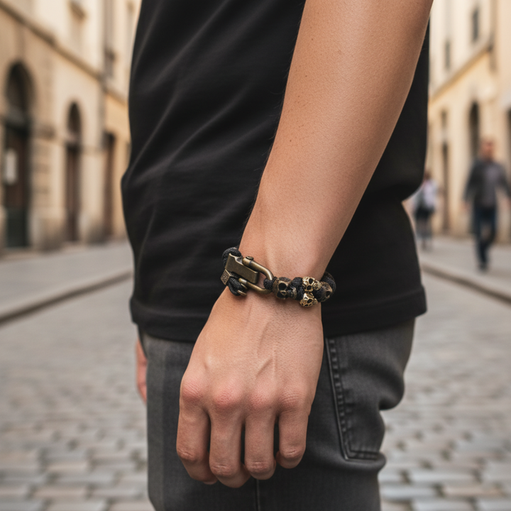 Braccialetto paracord da uomo con teschi in metallo bronzato