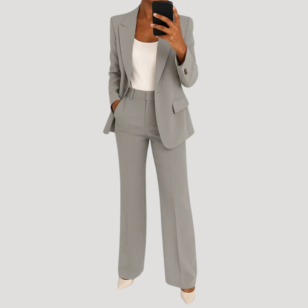 Completo elegante da donna in seta smart senza maniche, aderente con bottoni  