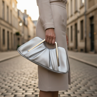 Borsa da donna con manico dorato in ecopelle