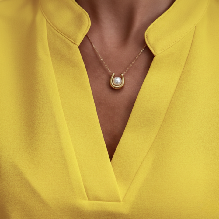 Blusa a V color pistacchio con maniche corte da donna