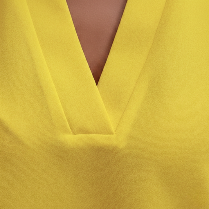 Blusa a V color pistacchio con maniche corte da donna