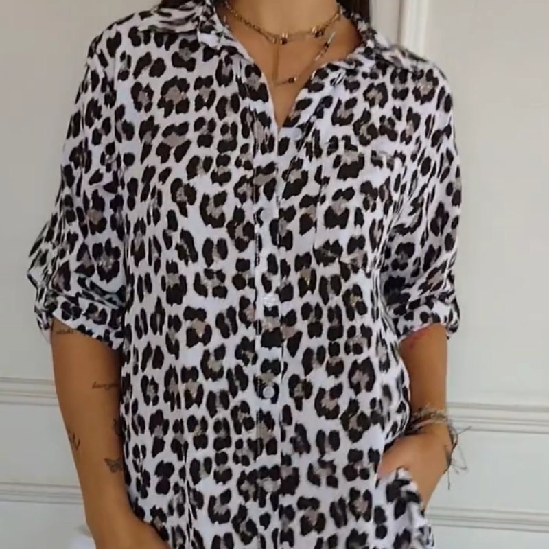 Blusa elegante con stampa leopardata