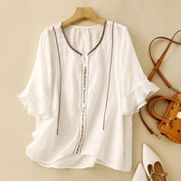 Blusa con maniche a volant e motivo