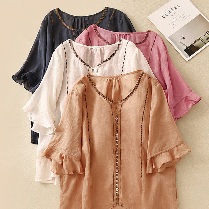 Blusa con maniche a volant e motivo