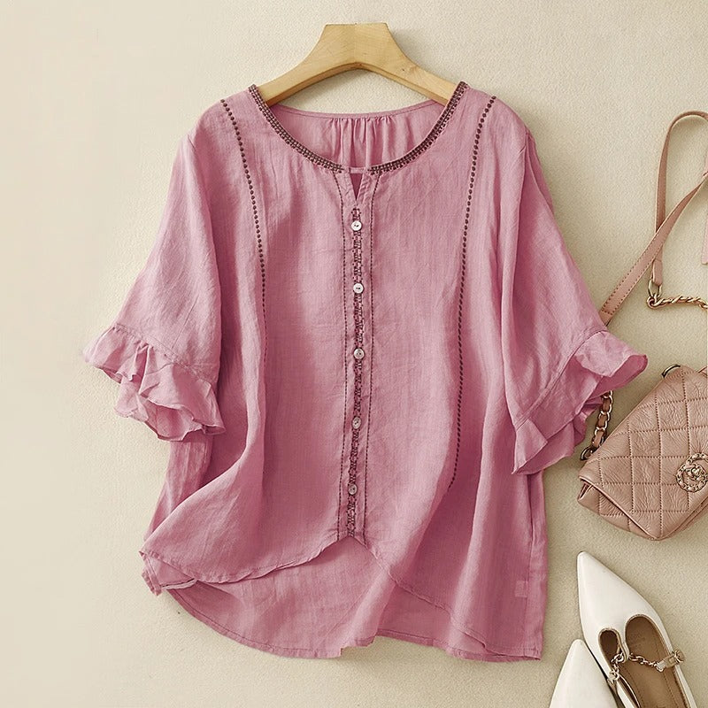 Blusa con maniche a volant e motivo