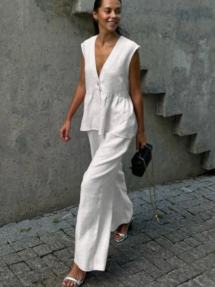 Completo donna con top senza maniche con volant e pantaloni larghi  