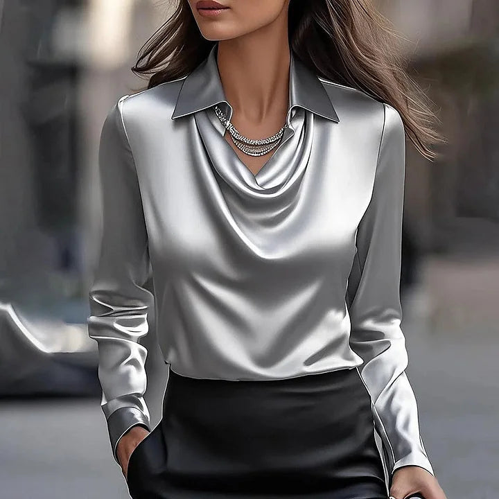 Blusa elegante lucida con scollo a V