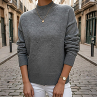 Maglione da donna a collo alto color bianco latte