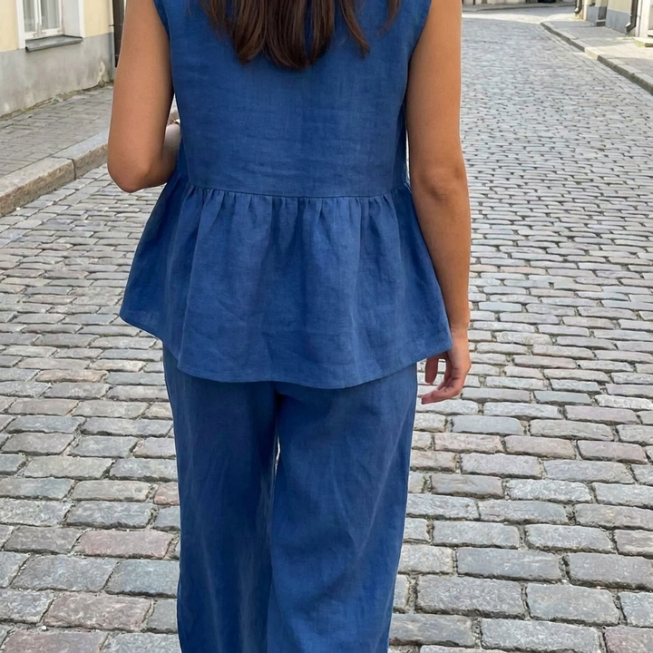 Completo donna con top senza maniche con volant e pantaloni larghi  