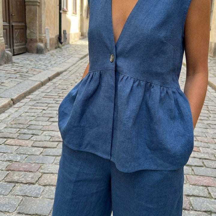 Completo donna con top senza maniche con volant e pantaloni larghi  