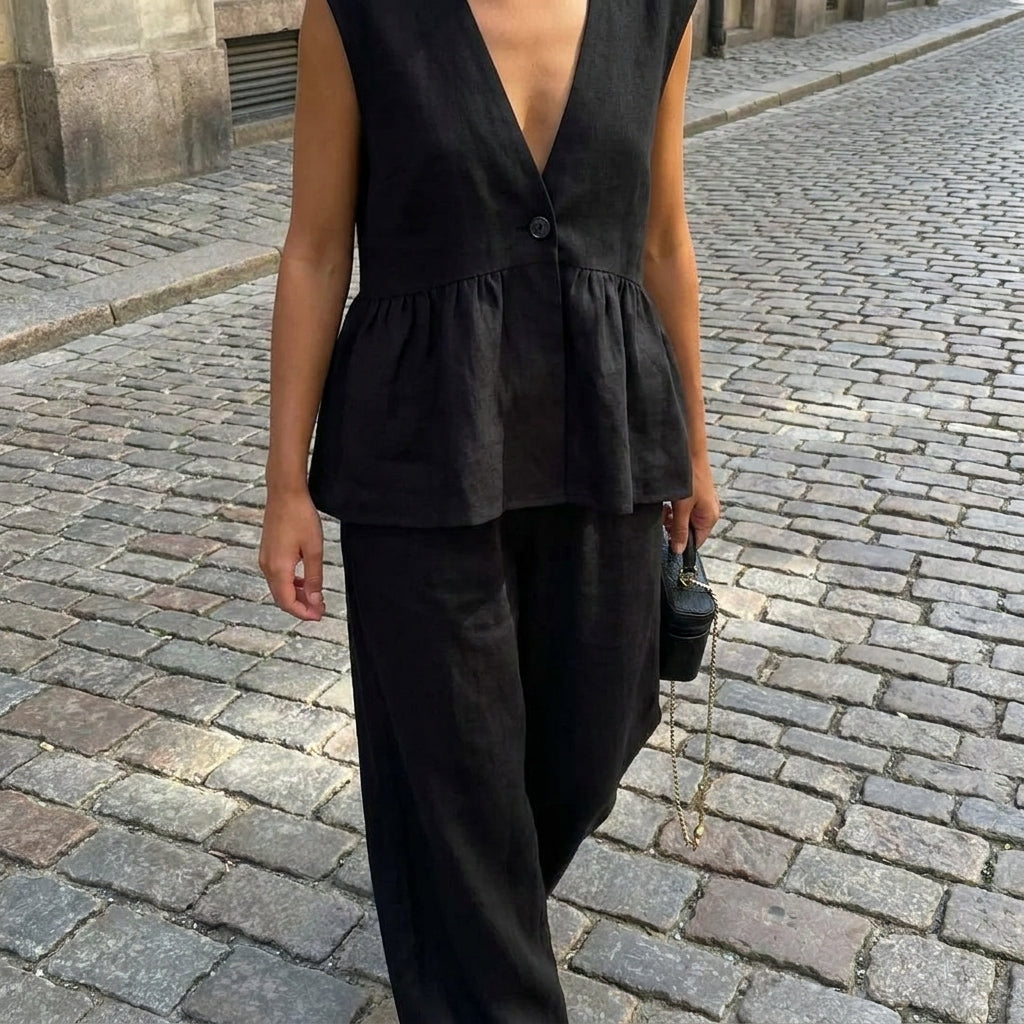 Completo donna con top senza maniche con volant e pantaloni larghi  