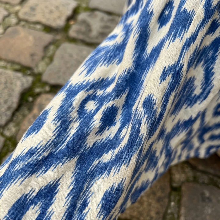Blue bohemian floral maxi dress fabric close-up