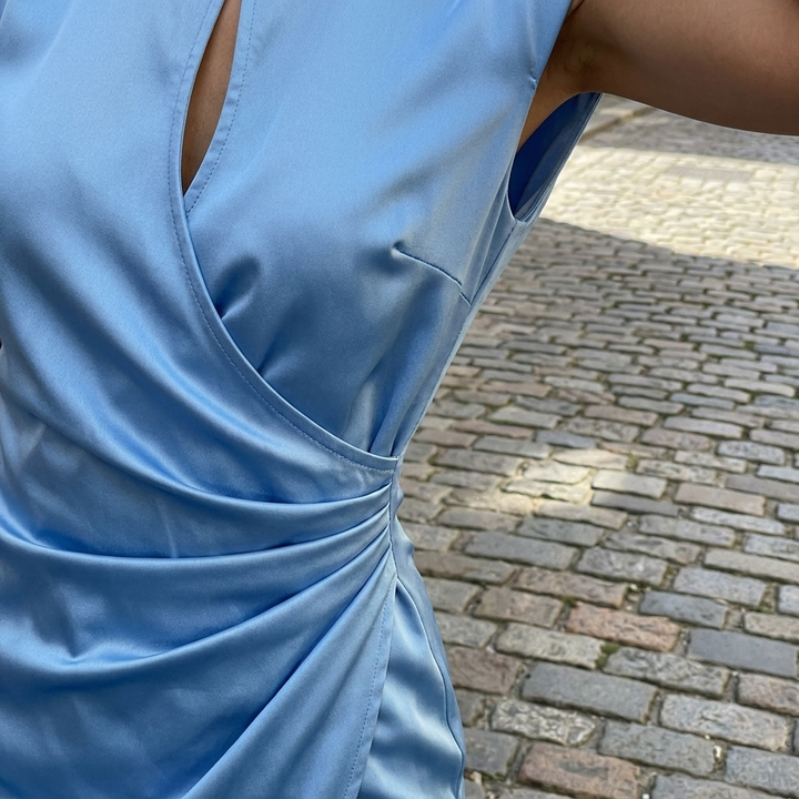 Light blue satin evening gown detail
