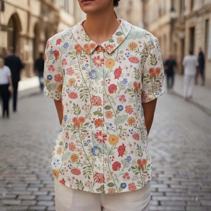 Blusa ricamata a maniche corte con colletto Peter Pan da donna