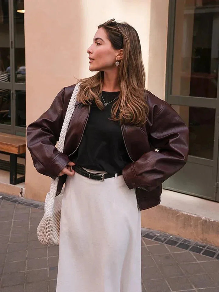 Giacca senza maniche da donna in look pelle vintage con bottoni